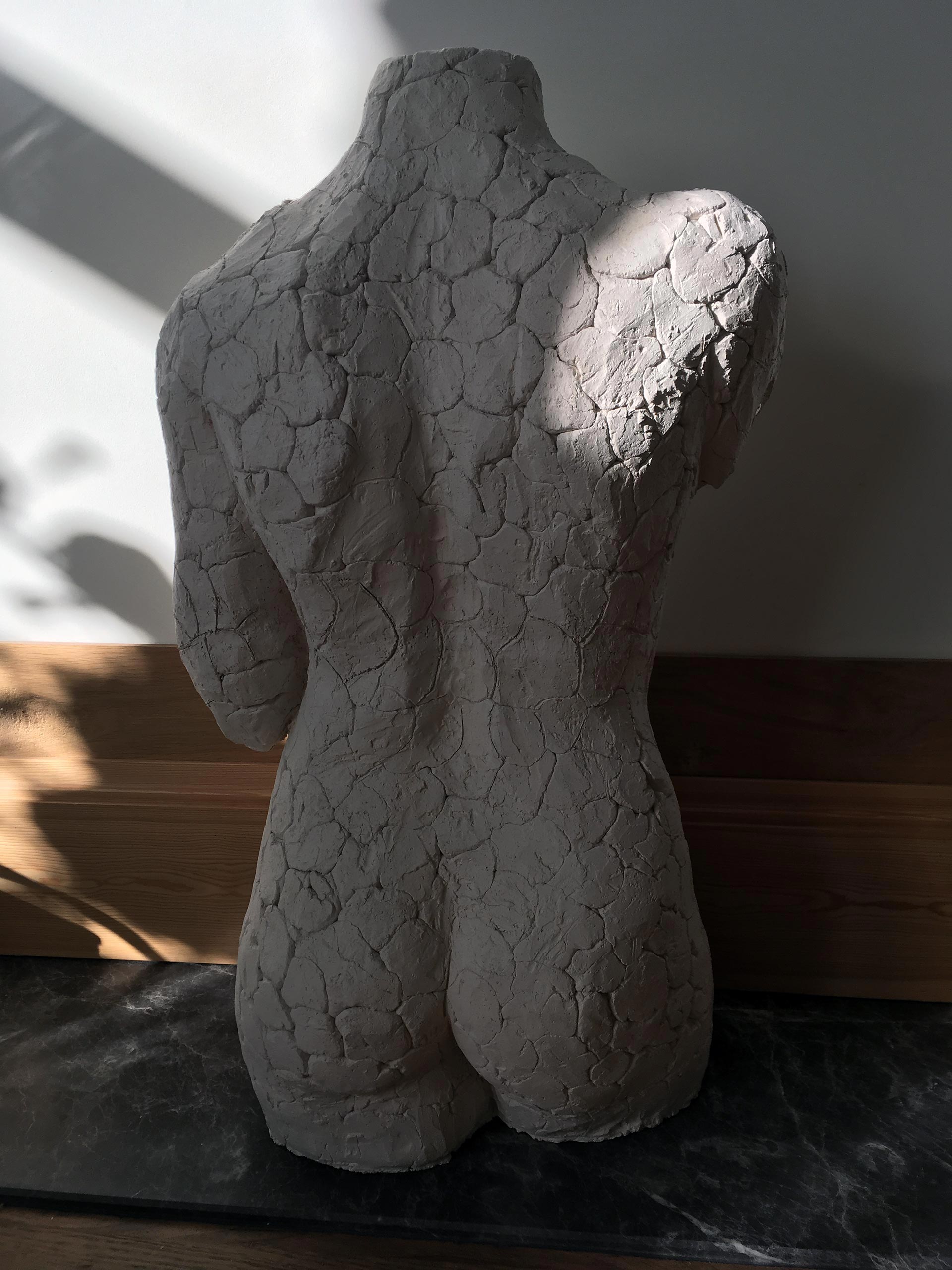 photograph of a sculpture made of clay-(c)an vanderhoydonck